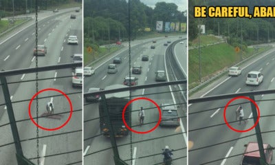 Watch: Kind M'Sian Driver Puts His Life In Danger To Remove Hazardous Object On The Road - World Of Buzz