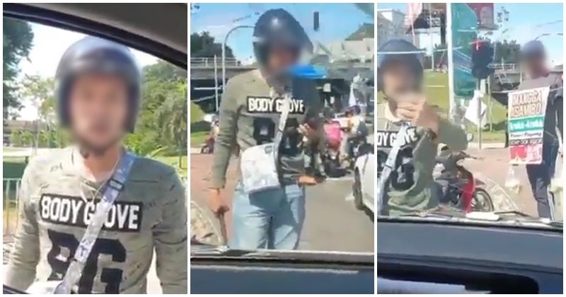 angry biker smashes the window of a van in a road rage incident at greenwood gombak world of buzz 4 1