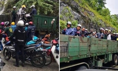 Kind M'Sian Trailer Drivers Keep Motorcyclists Safe By Fetching Them Over Flash Flood Area - World Of Buzz 2