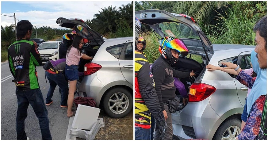 M'Sians Of All Races Help A Lone Female Driver Change Her Flat Tire Together, Makes Us All Proud - World Of Buzz