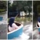 Teenagers Enjoy Monsoon Season By Making Makeshift Wake Board Out Of A Plastic Container - World Of Buzz 1