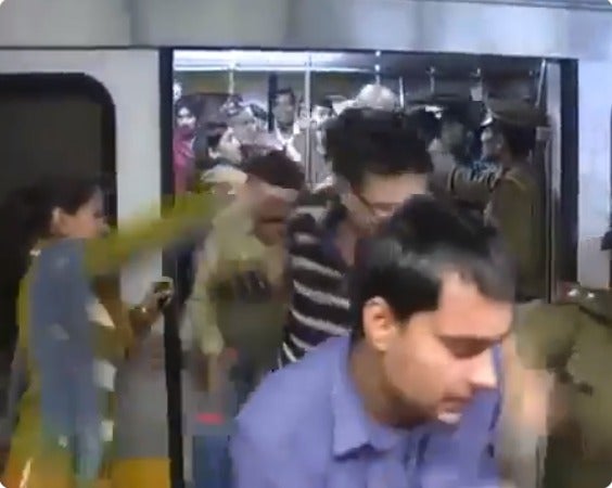 Men Travelling In Ladies-Only Train Coach Punished with Tight Slaps By Police Officers - WORLD OF BUZZ 1