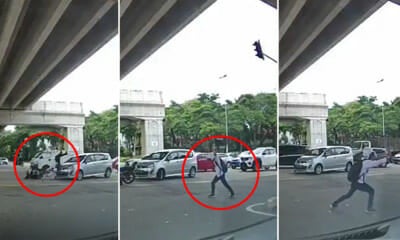 Watch: M'Sian Motorcyclist Gets Hit After Beating Red Light, Immediately Gets Up To Bersilat - World Of Buzz