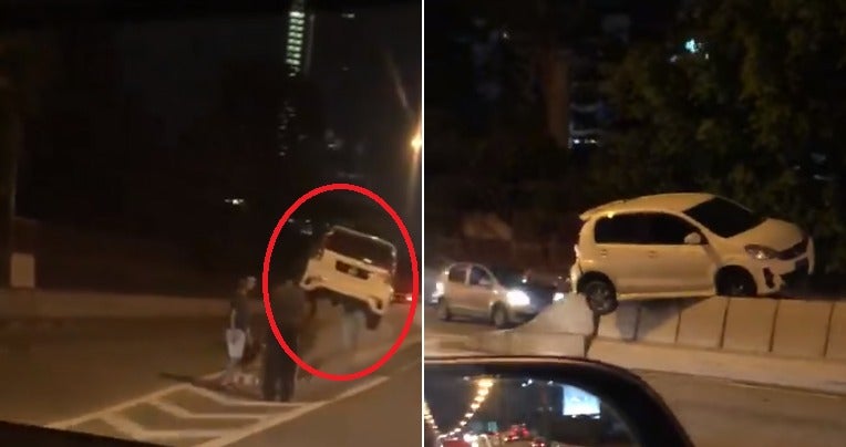 Video: &Quot;Flying&Quot; Myvi Gets Stuck On Top Of Divider At Jb, Netizens Amazed - World Of Buzz 2