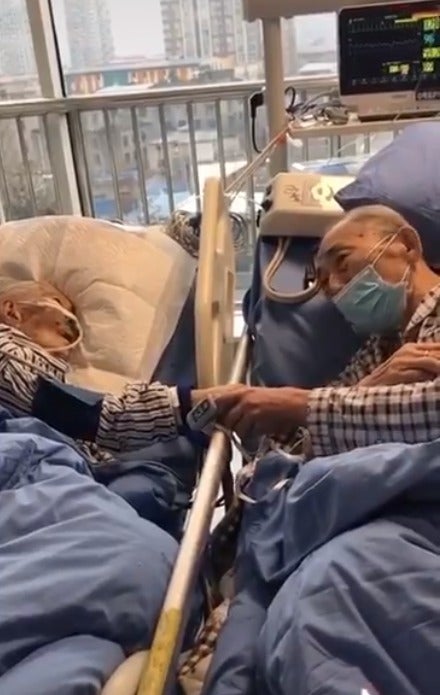 Elderly Couple Infected With Wuhan Virus Hold Hands &Amp; Bid Each Other Farewell For Possibly The Last Time - World Of Buzz 1