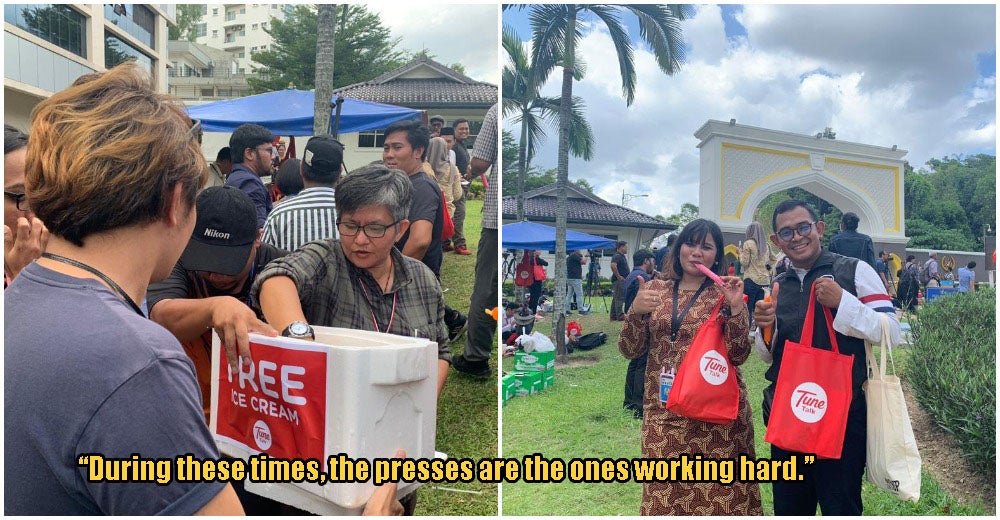 Photos: TuneTalk Gives Ice Cream, Water & Umbrellas To Tired Media As They Await Political Results - WORLD OF BUZZ 3