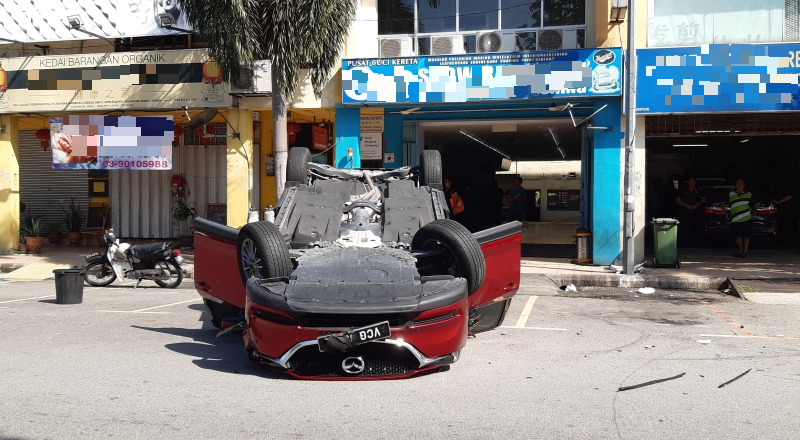 Unlicensed Foreign Worker Puts Car In Reverse Instead Of Drive, Overturns Cheras Woman's New Mazda - WORLD OF BUZZ