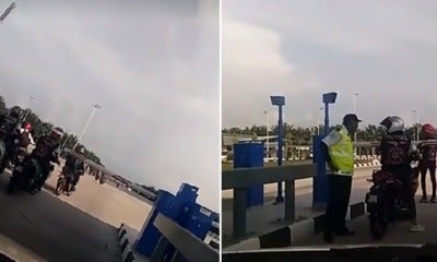 Video: Security Guard Shouts &Amp; Smacks M'Sian Motorcyclists Using Toll Lane Illegally - World Of Buzz 3