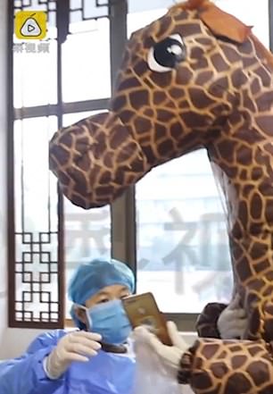 Woman Wears Full Giraffe Costume To Protect Against Coronavirus As She Couldn't Buy Face Masks - World Of Buzz 2
