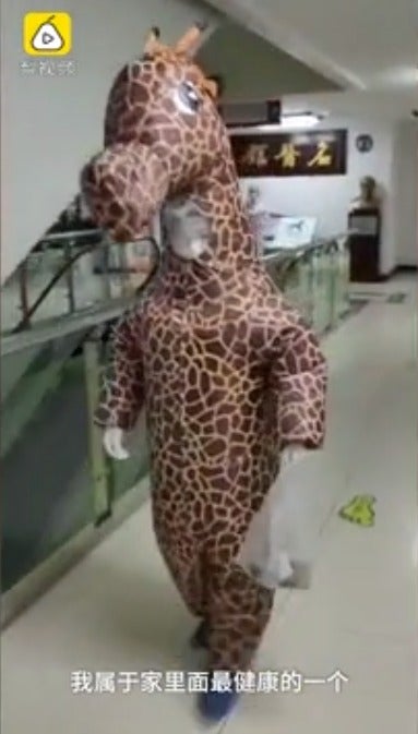 Woman Wears Full Giraffe Costume To Protect Against Coronavirus As She Couldn't Buy Face Masks - WORLD OF BUZZ