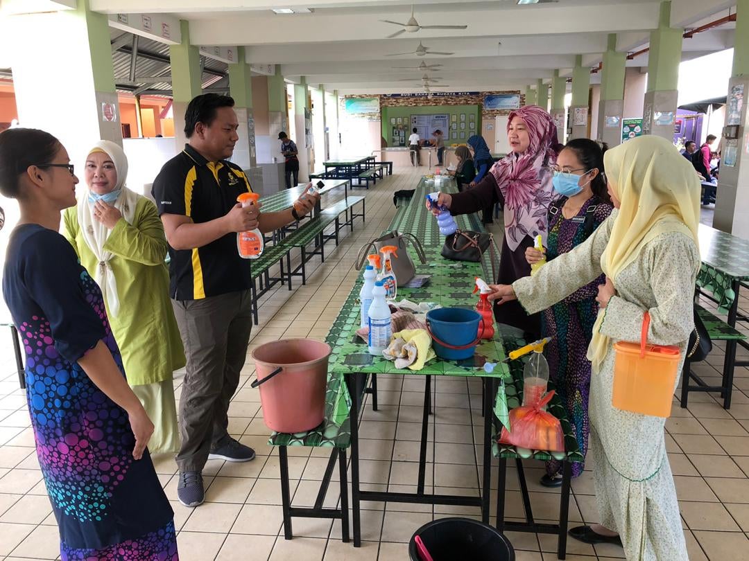 Teachers from a Sabah Primary School Launches Disinfection Programme to Protect Their Students - WORLD OF BUZZ 1