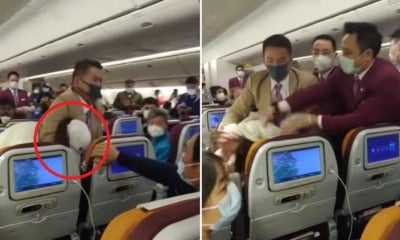 Thai Airways Cabin Crew Forcibly Restrain Passenger Who Purposely Coughed On Flight Attendant - World Of Buzz 3