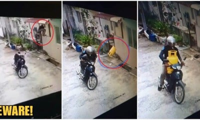 M'Sians Beware! Motorist Spotted Climbing Into Rawang House To Steal Gas Tank In Broad Daylight - World Of Buzz 4