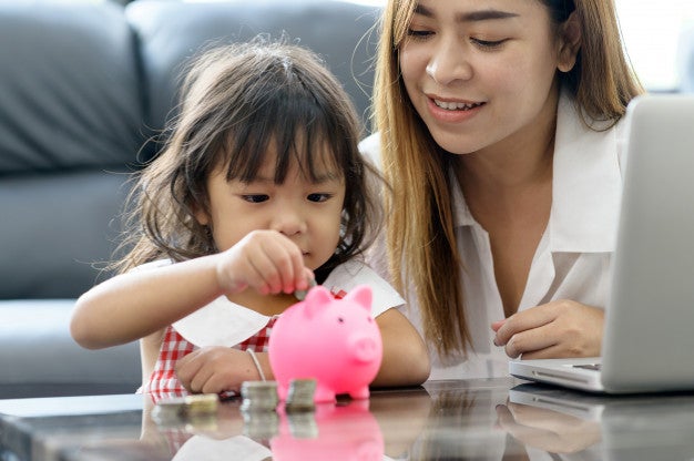 family asian saving money piggy bank save money 35534 293