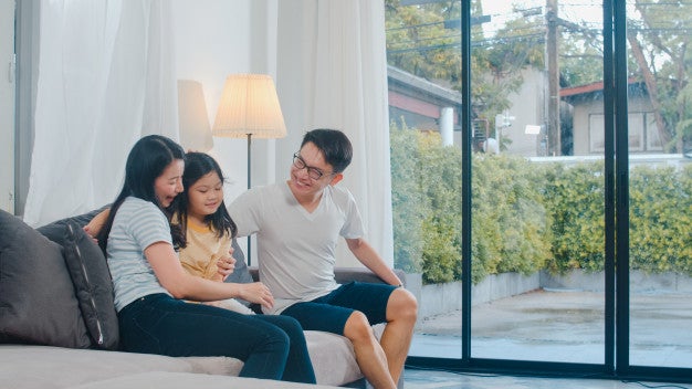 happy young asian family play together couch home chinese mother father child daughter enjoying happy relax spending time together modern living room evening 7861 2318