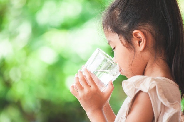 cute asian child girl drinking fresh water from glass 7186 2618