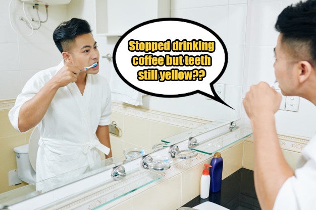 young asian man brushing teeth edited