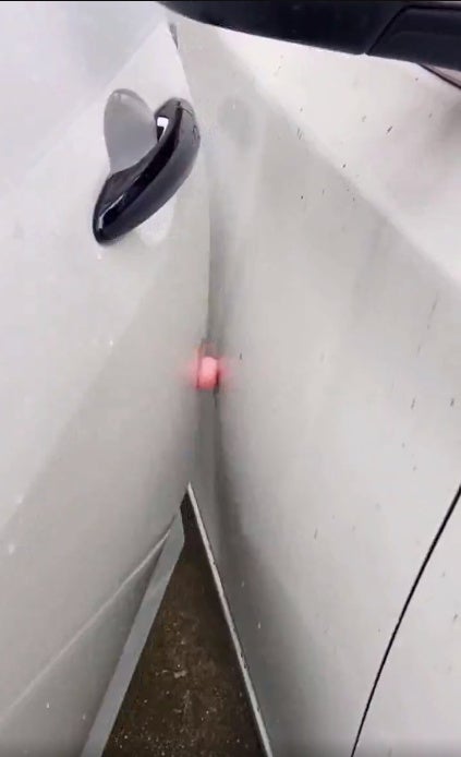 Butt sticker stops car doors from colliding
