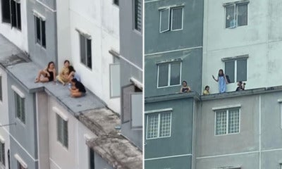 Indonesian Women Hanging Out On Ledge