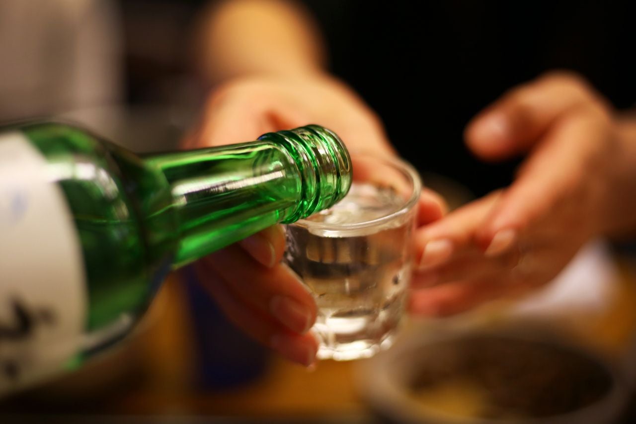 Soju being poured in a glass