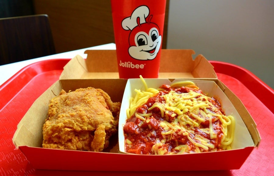 Jollibee Chickenjoy And Pasta On A Red Tray