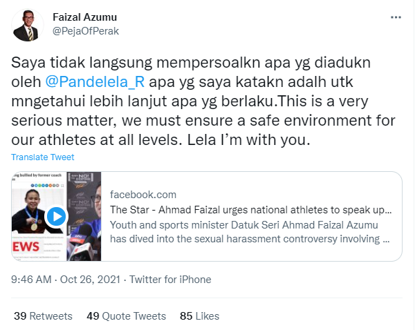 Faizal azumu stands with pandelela