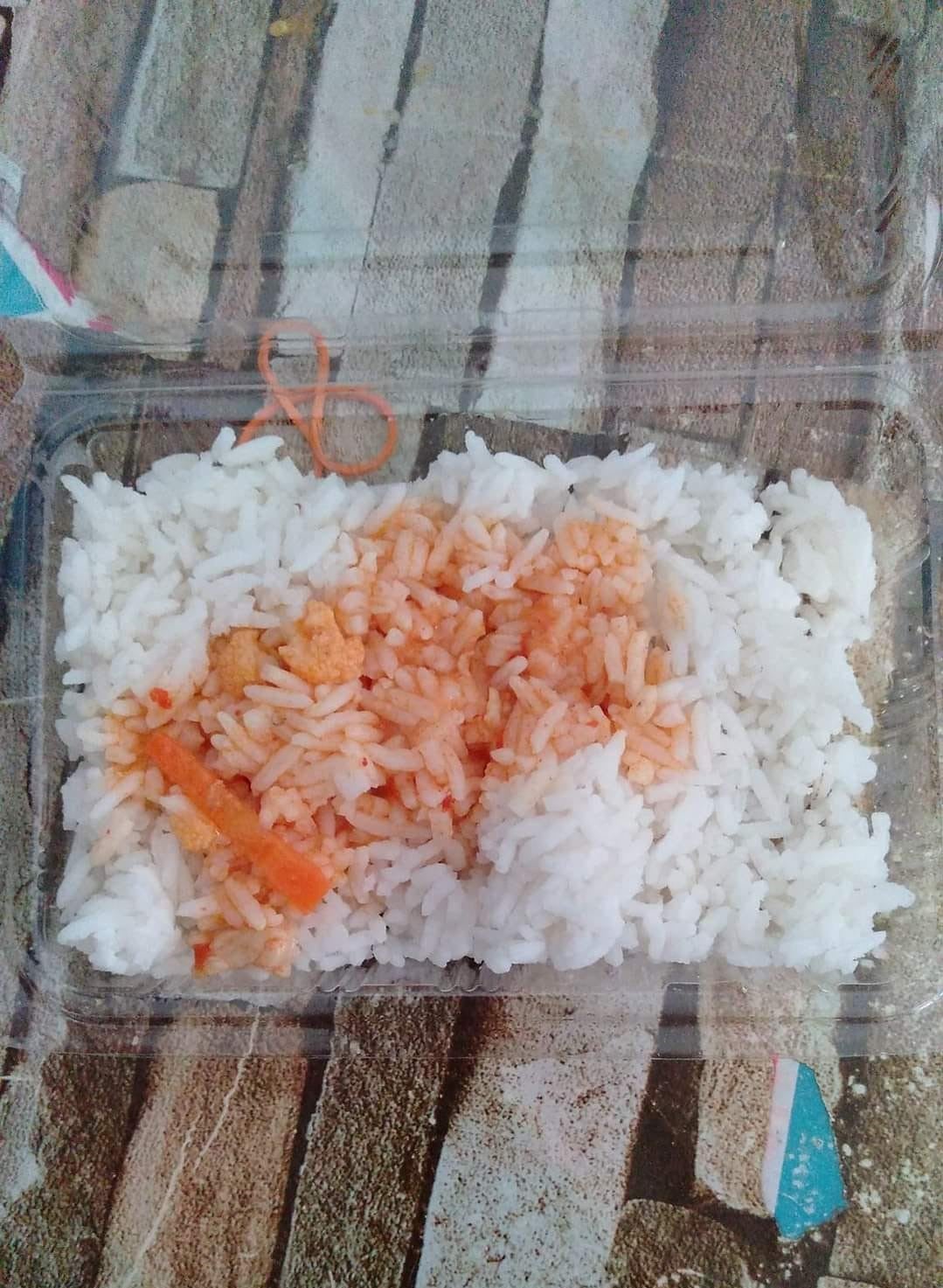 white rice with gravy given to students