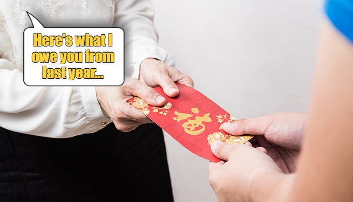 woman receiving ang bao during CNY Lunar New Year1