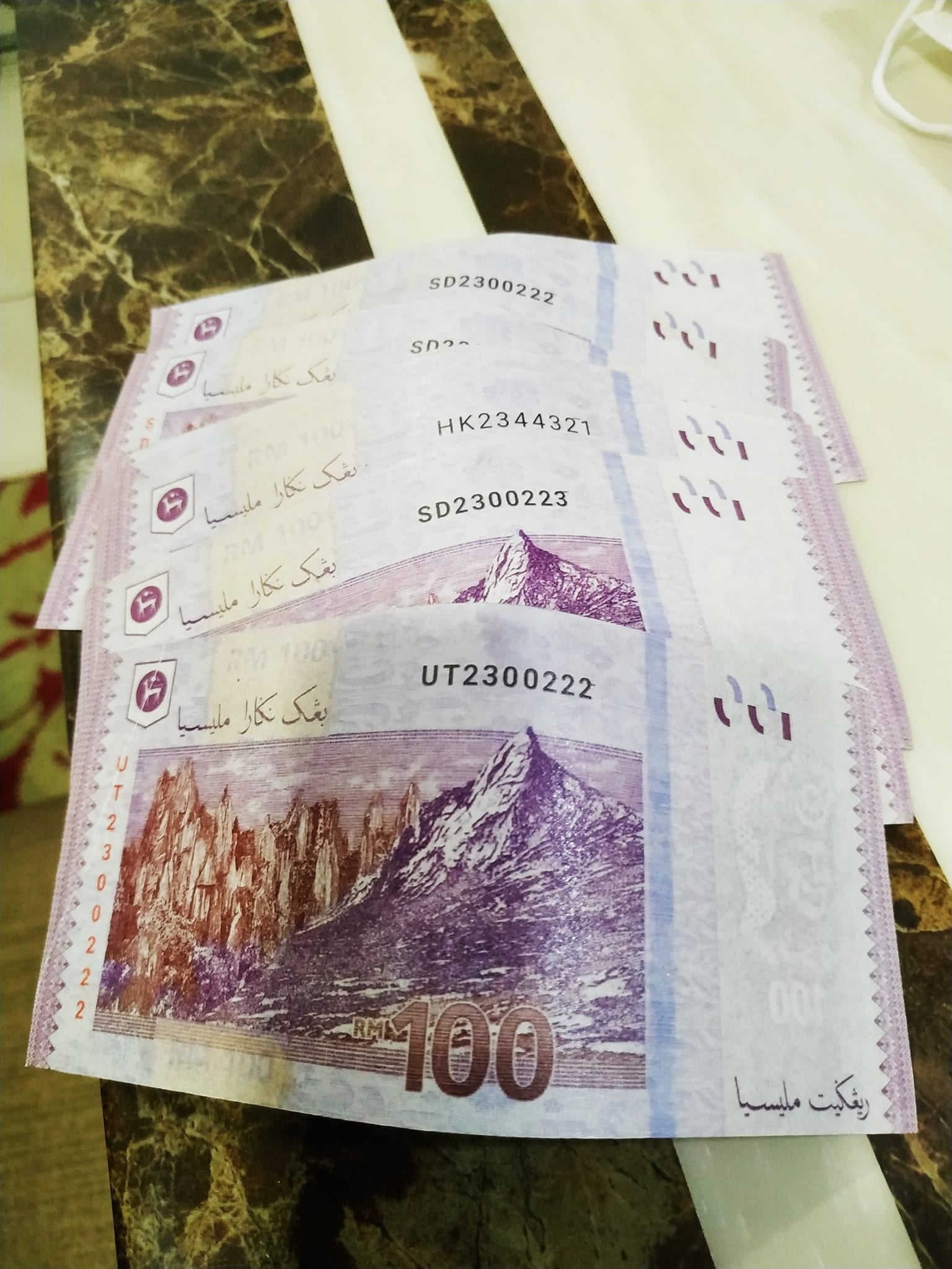 counterfeit rm100 bills