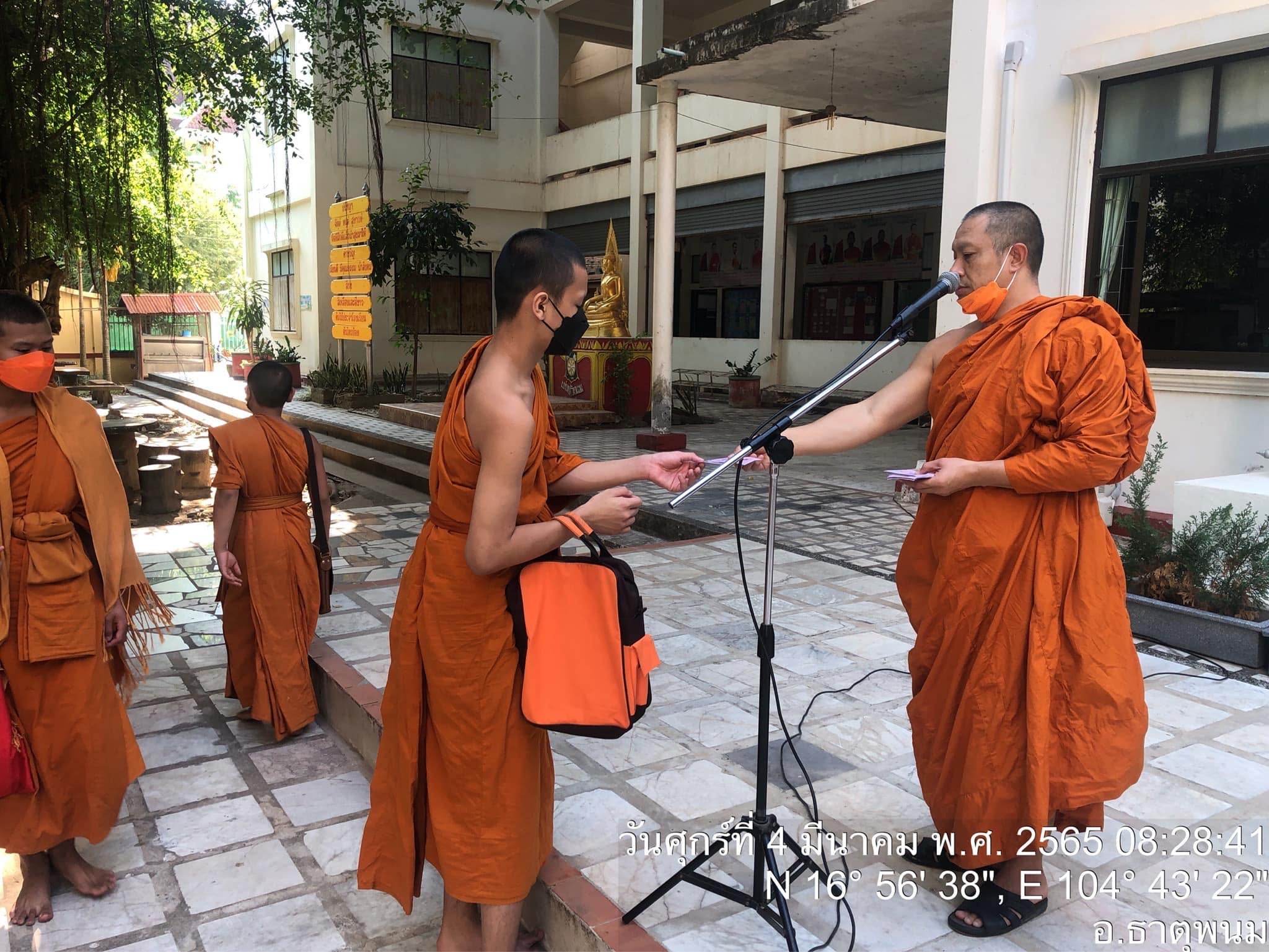 Thai Monk Give Money To Students