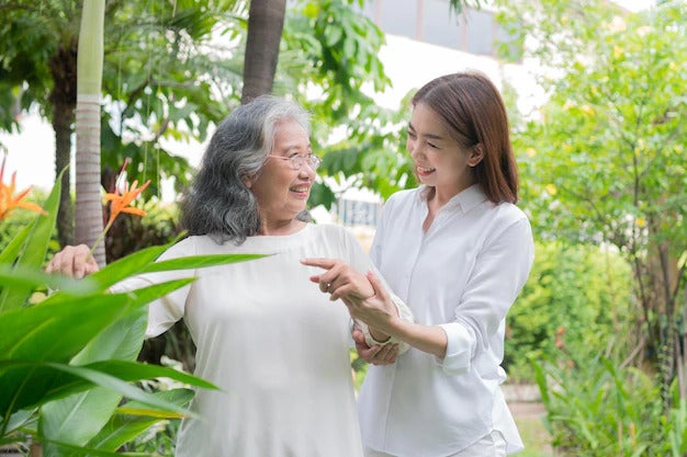 old elderly asian woman walking backyard with her daughter concept happy retirement 41689 2485 1