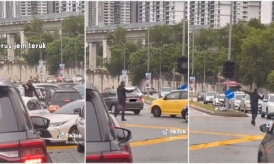 Man Help Ease Traffic Jam