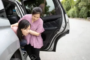 134655004 Asian Child Girl About To Throw Up From Car Sick Or Indigestion Female Teenage Vomiting In A Car Suf