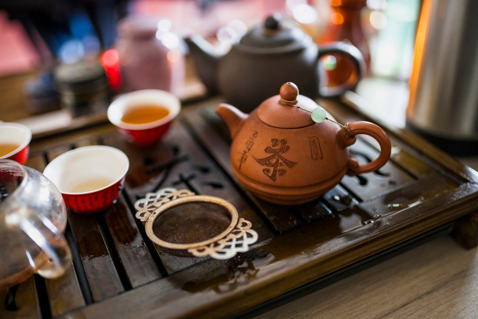 chinese tea set with metallic strainer wooden tray