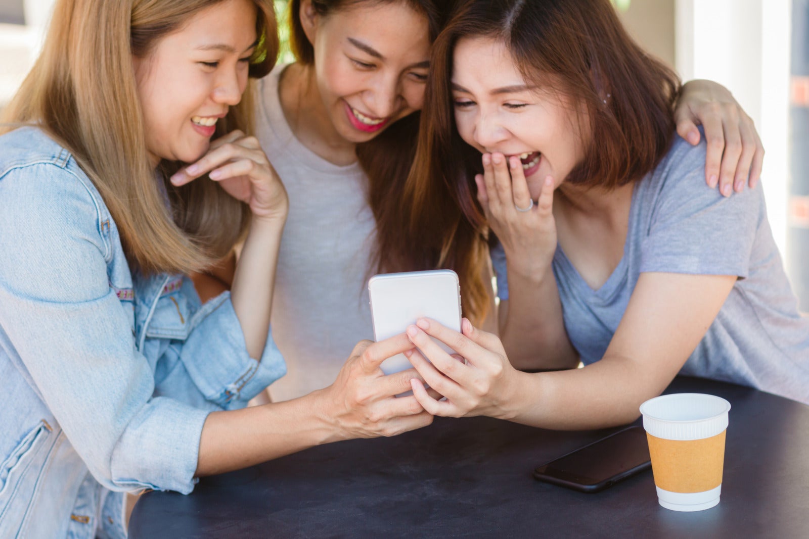 Cheerful Asian Young Women Sitting Cafe Drinking Coffee With Friends Talking Together