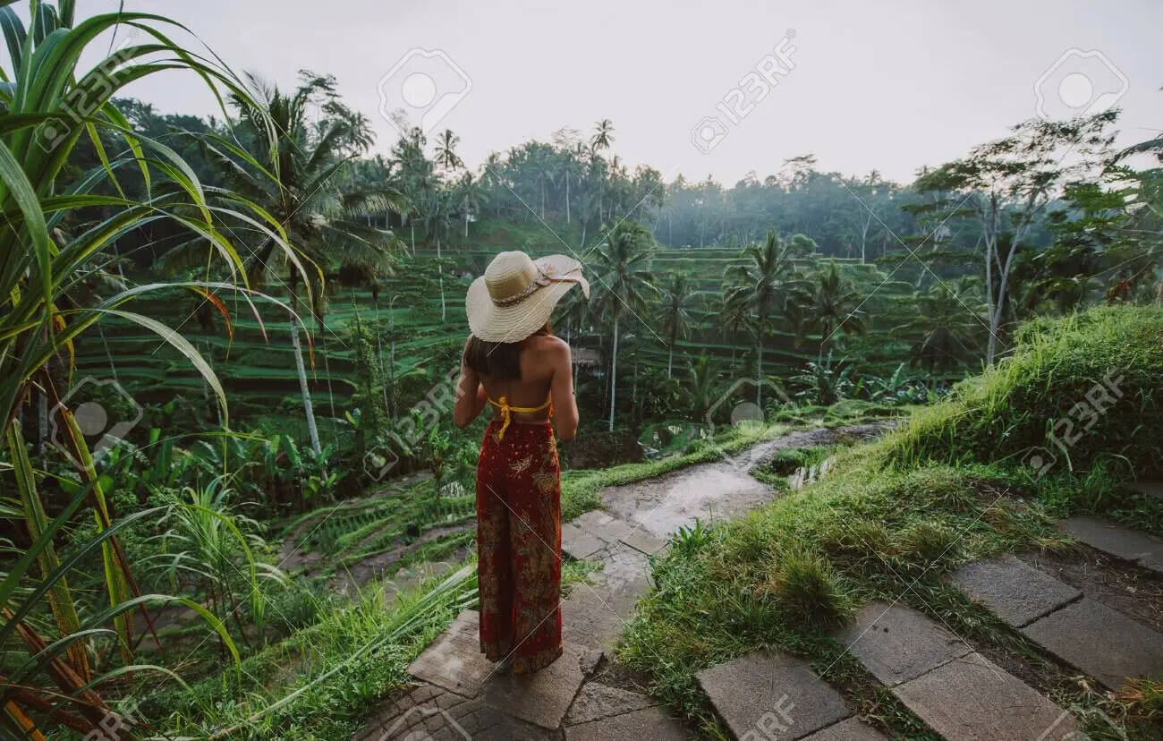 125909130 beautiful girl visiting the bali rice fields in tegalalang ubud concept about people wanderlust