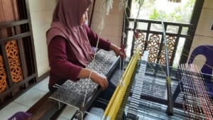 Weaver at Seri Gedong songket weaving workshop