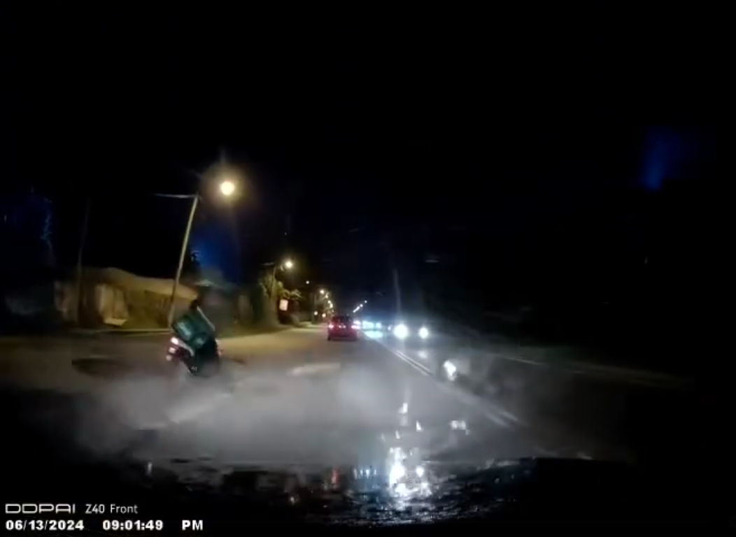 Motorcyclist Hit Pothole 4