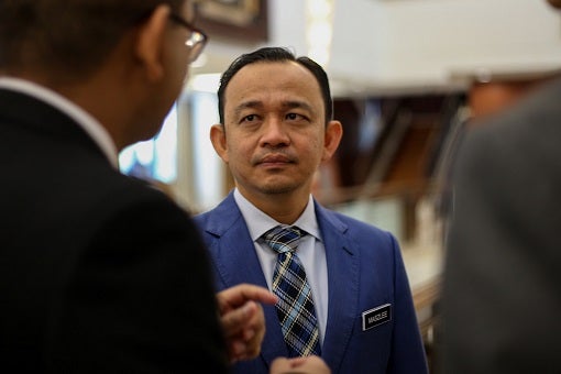 Education Minister Dr Maszlee Malik Discussing