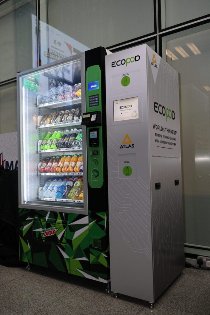 ATLAS ECOPOD ATTACHED WITH AN ATLAS VENDING MACHINE