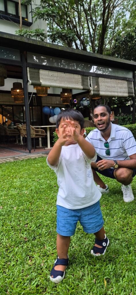 Prakash with his son