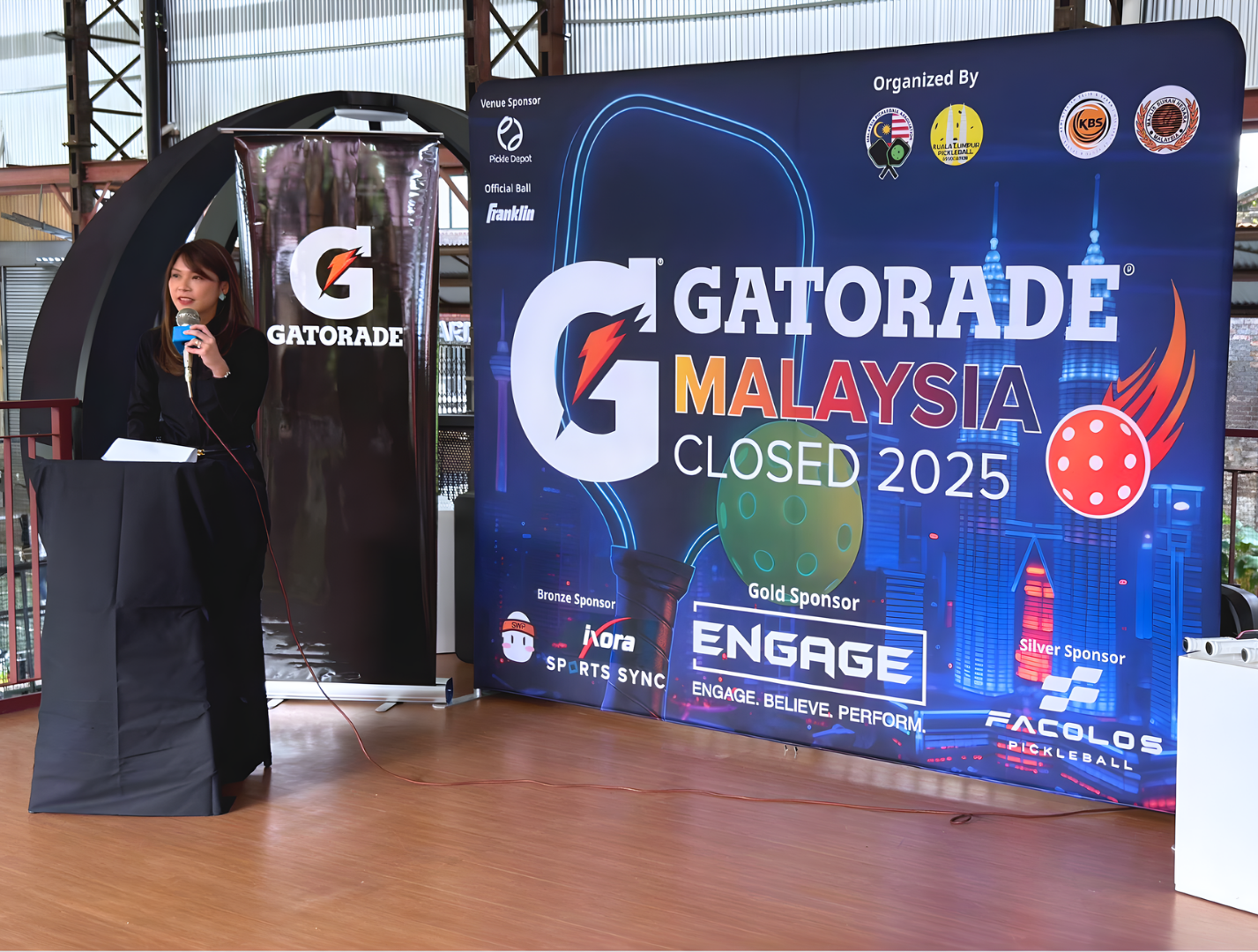 Amy Gan Vice President of Marketing at Etika Sdn. Bhd. speaks on Gatorades role in nurturing a strong sporting ecosystem and on empowering athletes during her opening remarks e1764344824755