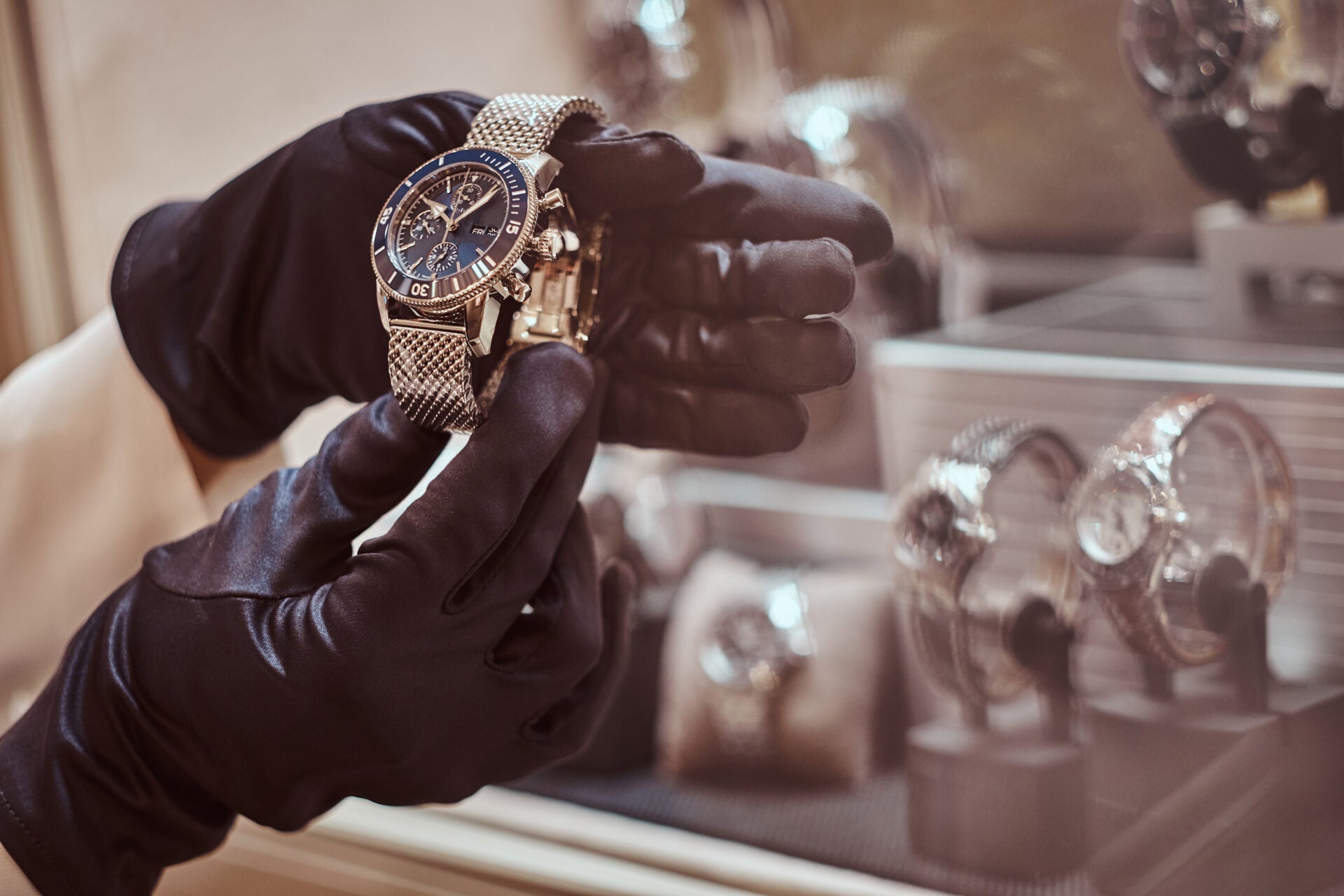 Close Up Seller S Hands Gloves Shows Exclusive Men S Watch From New Collection Luxury Jewelry Store
